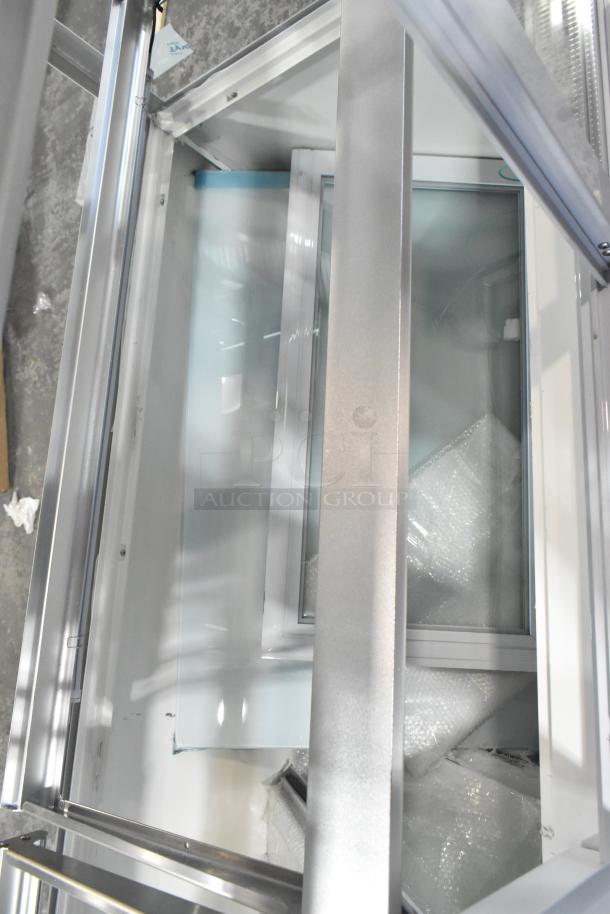 Brand new Avantco 193BCFD72W dry bakery display case, 70 7/8" white, with LED lighting, 115 volts, 1 phase, minor scratches.