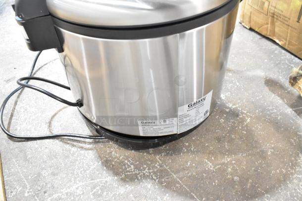 Brand new Galaxy 177RCSGB60 60 cup electric rice cooker/warmer. Stainless steel, 120V. Minor scratch and dent. Tags visible.