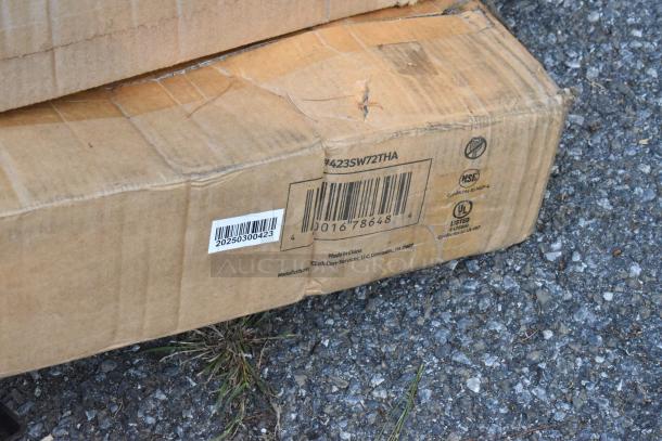 Cardboard box with ServIt 423SW72THA strip warmer. Visible barcode: 20250300423. Box shows wear and tear.