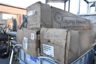 4 New H&K WCH-SS-611-T-BK Shortening Shuttles in damaged boxes. Visible labels show model SS-611T and shipping details.