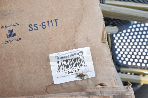Cardboard box with "SS-611T" marking and "The Shortening Shuttle" label, indicating a shortening shuttle model SS-611-T. Box shows signs of wear.