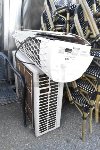 33,000 BTU wall-mount ductless split system and Friedrich AC/heat pump, model MR36Y3J, label indicating auction lot 207.