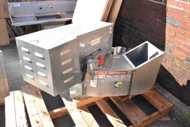 2 new CaptiveAire CASRE13BD commercial exhaust fans on pallets, metal construction, with factory tags visible.