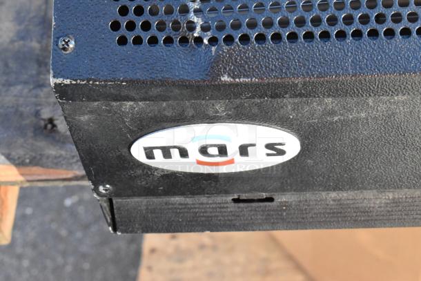 Mars LPV236-1UA-OB air curtain, low profile, 115V, 1 phase. Features Mars logo, sturdy black casing.