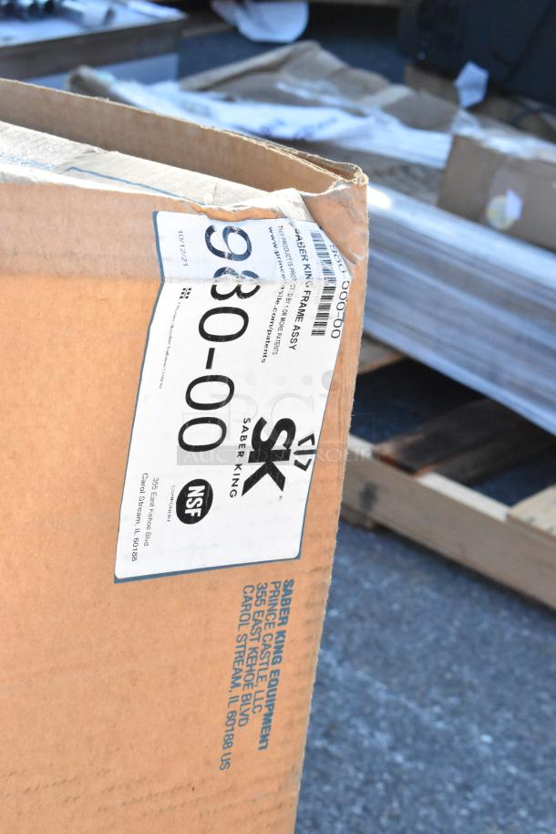 Cardboard box labeled "Saber King 980-00, NSF" for frame assembly. New condition. Includes Saber King, John Boos items.