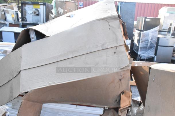 Brand new CaptiveAire DU85HFA metal commercial rooftop mushroom exhaust fan in original cardboard packaging.