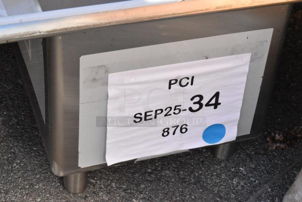 BRAND NEW Regency 600S11818218 stainless steel sink, single bay, dual drain boards, scratch and dent, no legs. Marked "PCI SEP25-34 876".