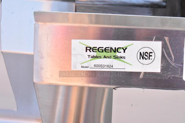 Brand new Regency 600S31824 94" stainless steel commercial sink with three compartments, 16-gauge, NSF label shown.