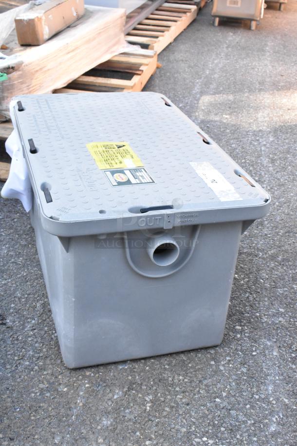 BRAND NEW Endura 3925XTA02 50 lb. 25 GPM grease trap with 2" hub, slight scratches, visible labels indicating specifications.
