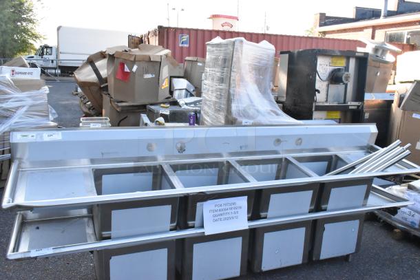 Brand new Regency 600S41818218 stainless steel commercial sink, four compartments, two drainboards, no legs, scratch and dent.