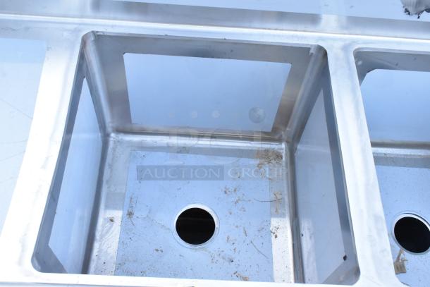 BRAND NEW SCRATCH AND DENT Regency 600S41818218 stainless steel four-compartment sink, 16-gauge, two drainboards, no legs.