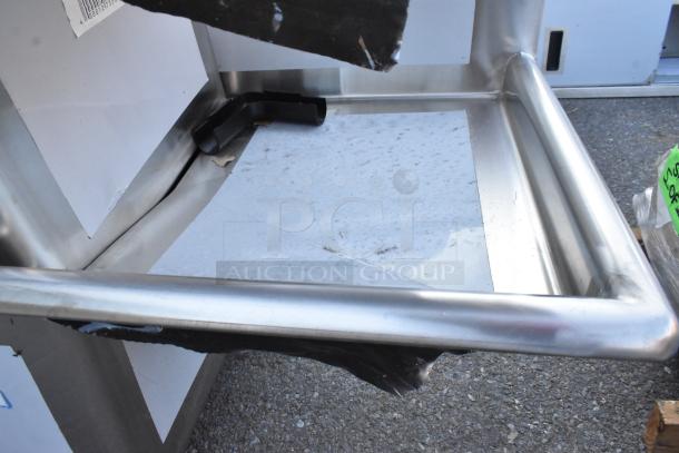 BRAND NEW SCRATCH AND DENT! Regency 600S41818218 Four Compartment Stainless Steel Sink with Drainboards, no legs.