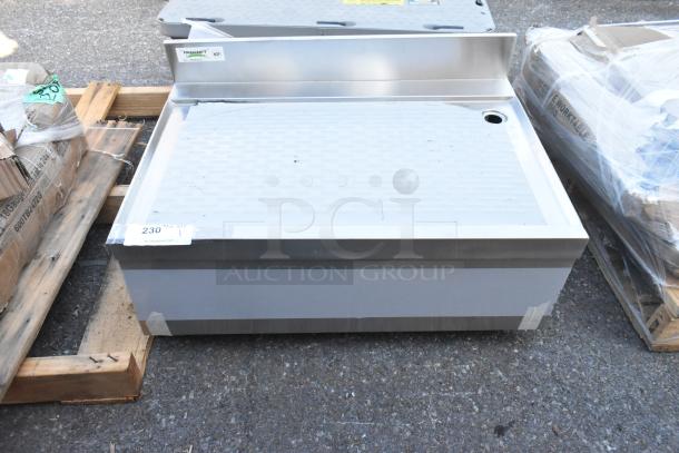 BRAND NEW SCRATCH AND DENT! Regency 600DBU2130 Stainless Steel Underbar Drainboard, 30" x 21", visible brand label, slight dent.