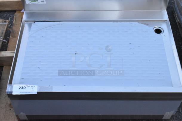 BRAND NEW SCRATCH AND DENT Regency 600DBU2130 stainless steel underbar drainboard, 30" x 21", minor cosmetic marks visible.