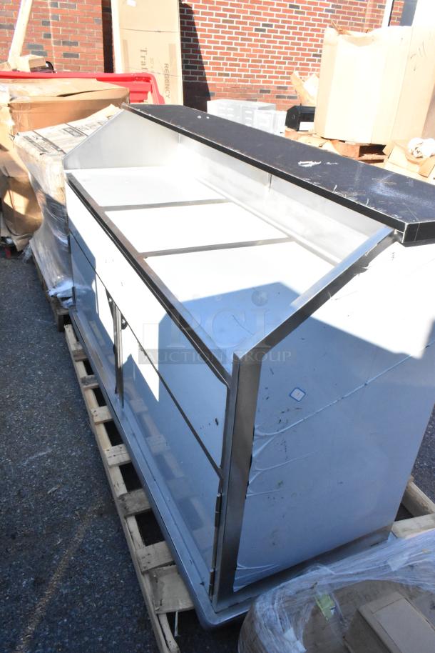 BRAND NEW Regency 600PB74S 74" stainless steel portable bar, with two removable speed rails, ice bin, and cover. Minor scratches.