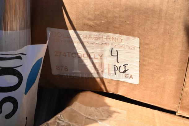 Label on box indicating '274TCDOLLY' trash can dolly, part of a lot of scratched and dented auction items.