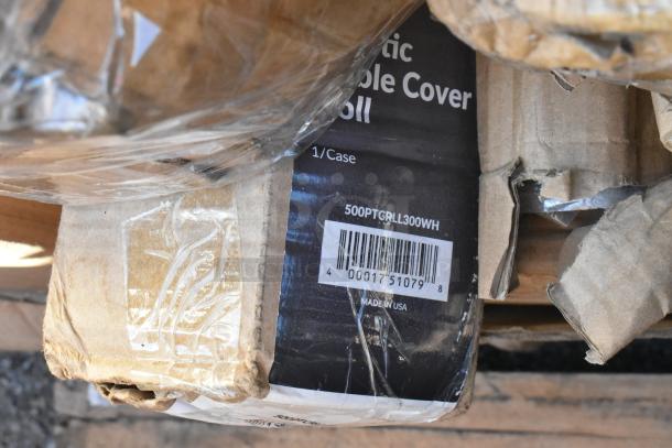 Box with plastic table cover roll, barcode 00017510798, label "500PTGRLL300WH," partially wrapped in plastic, Made in USA.