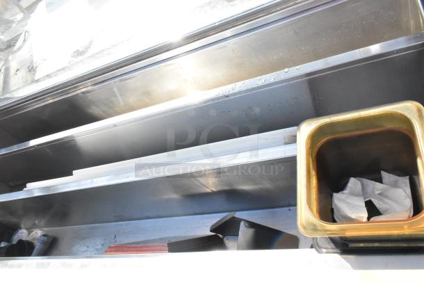Duke SWD600-600FL metal commercial subway sandwich prep line, 120V, 1 phase, shows metal compartments and trays.