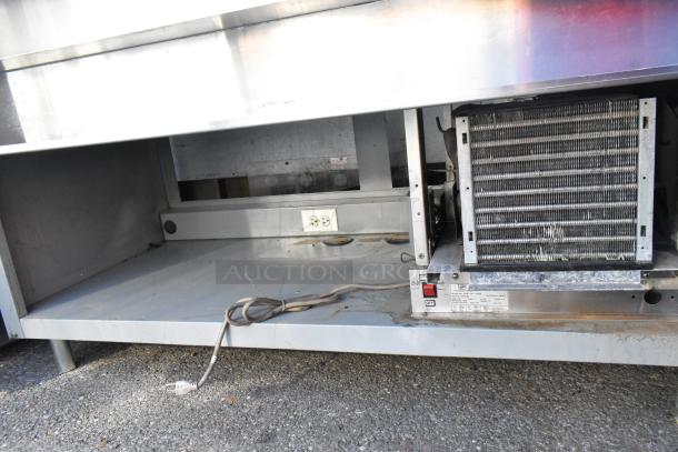 Duke SWD600-600FL commercial prep line for Subway, metal construction, 120 volts, 1 phase. Visible power outlet and switch.