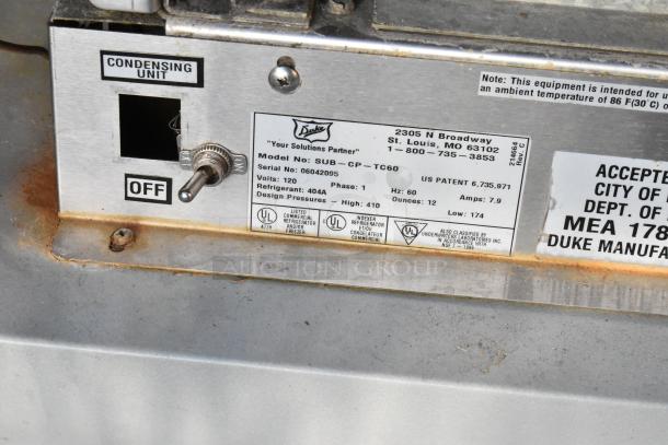 Duke SWD600-600FL subway sandwich salad prep line label showing model SUB-CP-TC60, 120V, phase 1, refrigerant 404A.