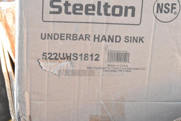 Box for Steelton 522UHS1812 underbar hand sink, scratch and dent condition, labeled with manufacturer details.