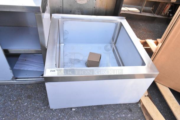 Brand new Steelton 522MS242412 mop sink, 24"x24"x12", 16 gauge 304 stainless steel, minor scratches and dents visible.