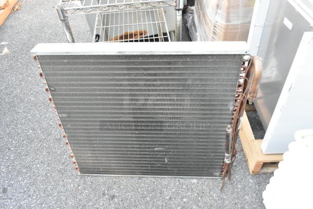 Nationwide Coils evaporator coil, industrial-grade, metal fins, copper tubing, good condition, suitable for HVAC systems.