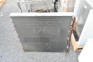 Nationwide Coils evaporator coil, industrial-grade, metal fins, copper tubing, good condition, suitable for HVAC systems.