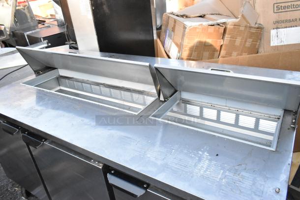 Beverage Air SPE72HC-18 stainless steel commercial prep table, bain marie top, on casters. 115V, 1 phase. Good condition.