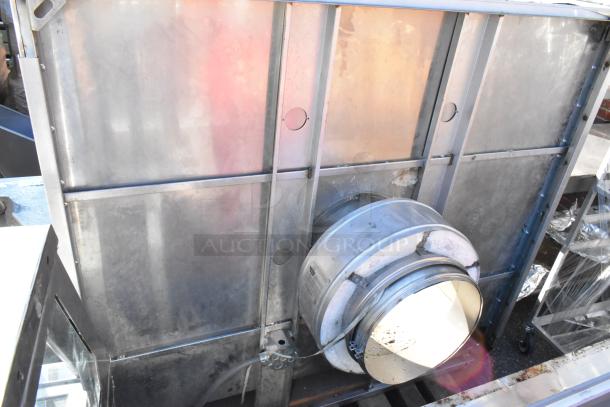 5' CaptiveAire 6024 VHB stainless steel commercial grease hood, used condition, visible duct and mounting brackets.
