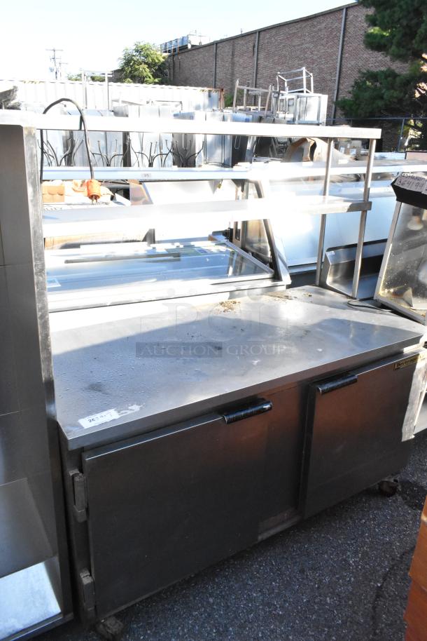 Beverage Air WTR60A stainless steel cooler, 2 doors, 2-tier overshelf, on commercial casters, 115V, 1 Phase, good condition.