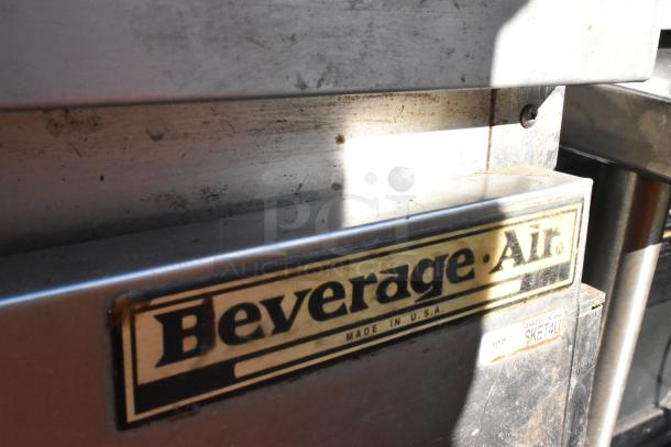 Beverage Air WTR60A stainless steel cooler, 2-door, with 2-tier shelf on casters, label shows brand and origin.