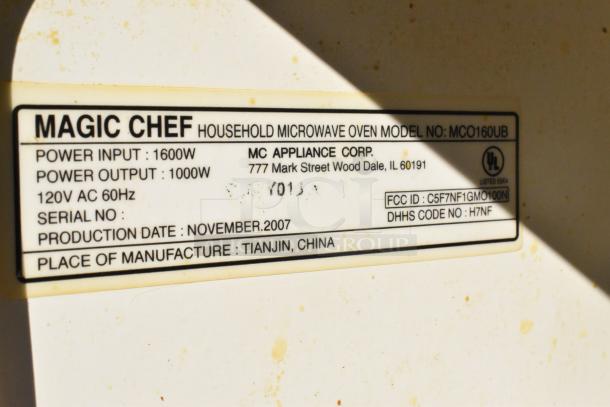 Magic Chef MCO160UB microwave oven label showing 1600W input and 1000W output, made in Tianjin, China, November 2007.