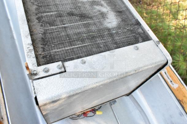 Harford Walk-In Box with Bohn 115 Volt, 1 Phase Evaporator Fan, metallic exterior, minor wear visible.