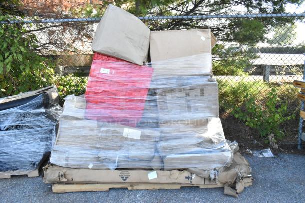 Pallet of 16 brand new scratch and dent items, wrapped in plastic, including a garbage disposer, mop sink, shelf warmer.