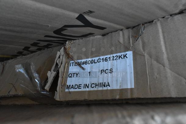 Label on damaged box showing "ITEM#600LC16122KK," "QTY: 1 PCS," and "MADE IN CHINA." Box corner is torn.