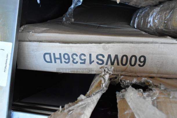 Sealed box labeled "600WS1536HD," showing new Regency stainless steel items in scratch and dent condition, ready for auction.