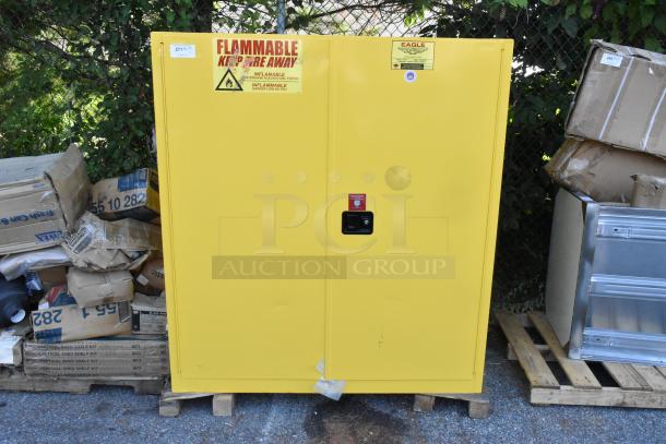 BRAND NEW Eagle 5510X Yellow Safety Cabinet, 110 Gal, 2 self-closing doors & shelves, with scratch and dent. Flammable label visible.