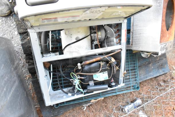 2 metal wall mount water fountains showing internal components and compressor. Used condition, some wiring visible.