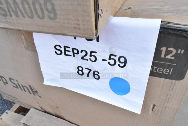 Box labeled "12-inch Steel" with handwritten note "SEP25-59 876" for new scratch and dent items, including sheet pan and mop sink.