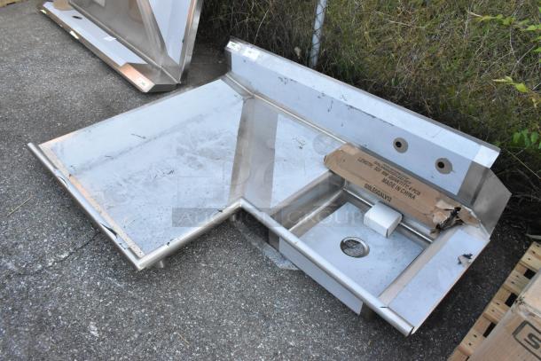 BRAND NEW Regency 4' 16-Gauge Stainless Steel Soiled L-Shape Dishtable, left landing; minor scratches, boxed parts visible.
