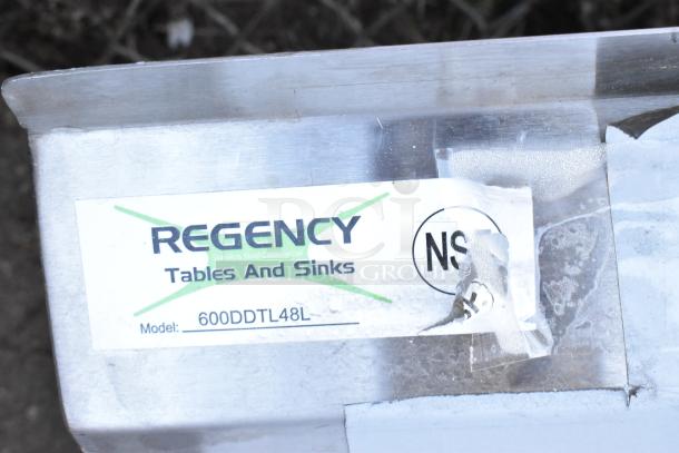 BRAND NEW Regency 600DDTL48L 4' L-Shape Dishtable, 16-Gauge Stainless Steel, Left Landing, Scratch and Dent, Seaga Logo.