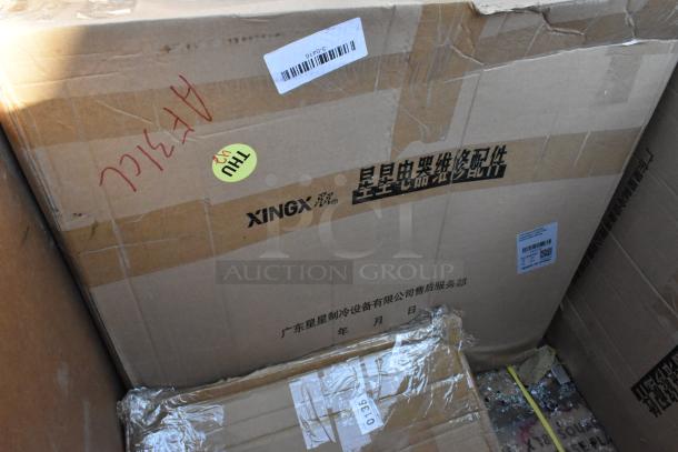 6 Seaga scratch and dent items, including table base plate. Brand-new packaging with visible box damage.