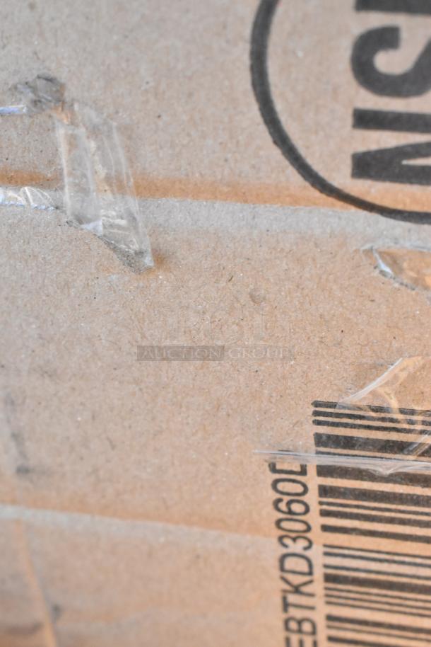 Cardboard box with tape and barcode, labeled SEBTKD3060C. Part of 6 Seaga scratch and dent items, table base plate included.