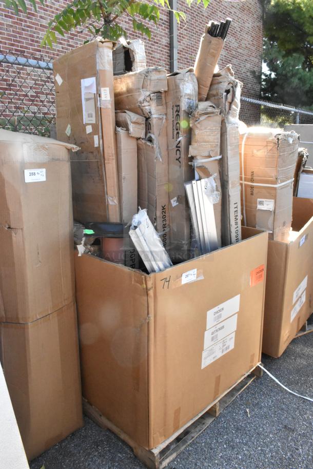 11 Seaga scratch and dent items, including pan racks, in damaged boxes. Labels show "Made in China" and "Regency."