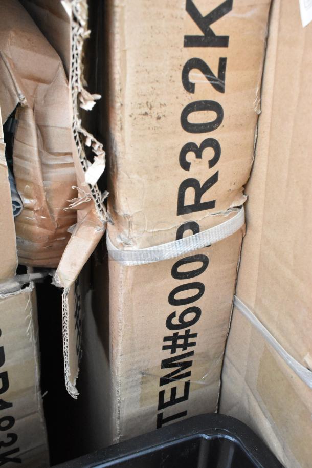 11 Seaga items including pan racks, brand new with scratch and dent packaging, ITEM#600PR302K visible on box.