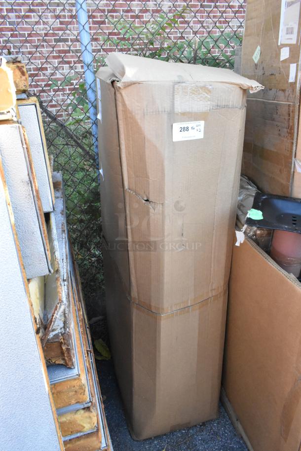 Cardboard boxes possibly containing Regency aluminum dunnage racks. Box is slightly damaged with visible label indicating quantity.