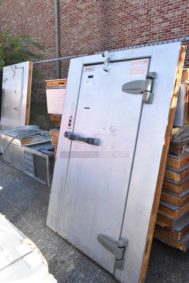 Kolpak Walk-In Box door with latch; features Kolpak PC075S2 115V compressor. Good condition, exterior visible.