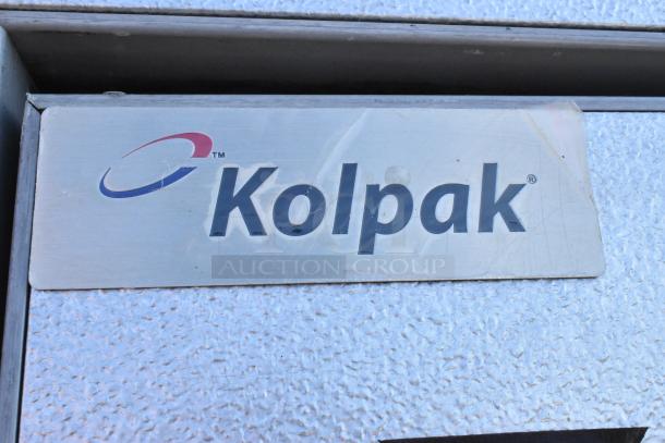 Kolpak Walk-In Box with Kolpak PC075S2 115V, 1-Phase Compressor. Features Kolpak logo on textured surface.