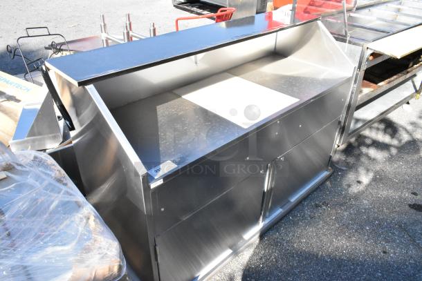 Brand new Regency 600PB63S 63" stainless steel portable bar with removable speed rails and ice bin, minor scratches.